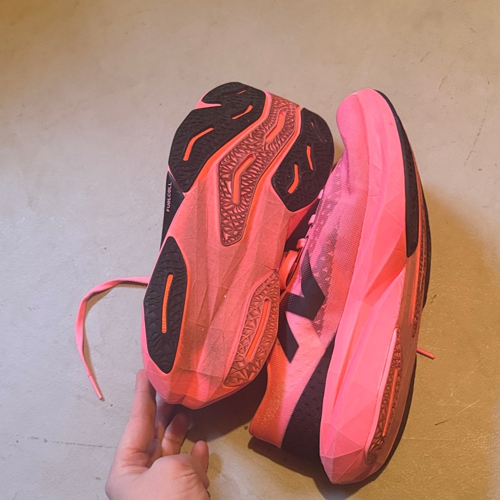 New Balance FuelCell Rebel v4
Women's Pink and Black Athletic Shoes - Picture 3 of 8